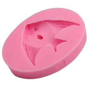 Pink silicone fondant mold featuring detailed angelfish design for DIY cake baking