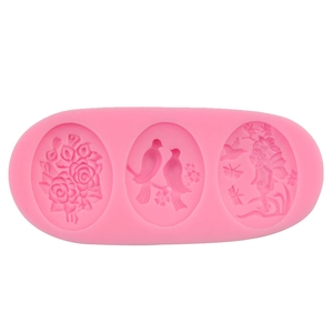 Stampo in silicone rosa per fondente con motivi a rilievo di rosa, uccello e angelo