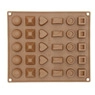 Macro detail of brown silicone mold with various geometric shapes for chocolate and DIY candy