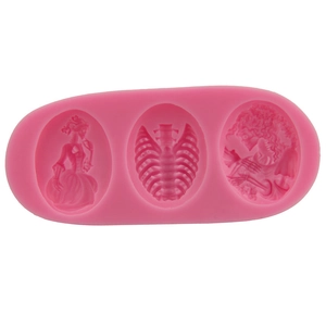 Pink silicone skull and ribcage fondant mold for DIY gothic cake baking and crafting