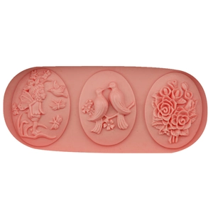 Stampo in silicone rosa per fondant con motivi a rilievo di fata, uccellini e rose