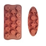 Macro detail of spoon-shaped silicone chocolate mold with star and gear patterns