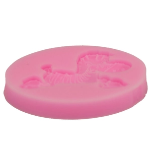 Pink silicone fondant mold featuring a detailed horse pattern for DIY cake decorating