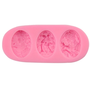 Stampo in silicone rosa per fondant con tre disegni di fate classiche dettagliati