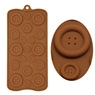 Detail of brown silicone mold featuring various button shapes for chocolate and fondant