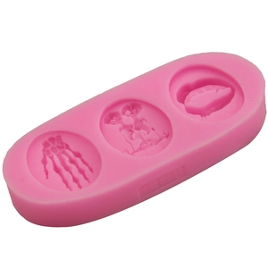 Pink silicone skeleton bone fondant mold with three cavities for DIY cake decorating