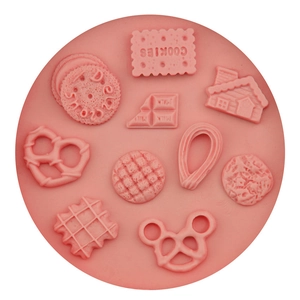 Pink silicone mold featuring 10 mini dessert shapes for DIY fondant and baking projects