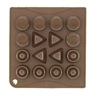 Detailed top view of a brown silicone baking mold with round and triangular cavities