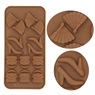Detail of 6-cavity silicone mold featuring fan and high heel embossed shapes for DIY baking