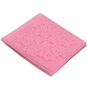 Pink silicone cake mold featuring intricate mandala floral lace embossing for DIY baking
