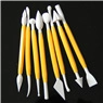 Detail of 8-piece yellow double-headed fondant sculpting tools for cake modeling