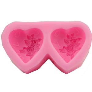 Pink heart-shaped silicone mold with LOVE letters and rose flower relief for baking