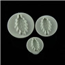 Close-up of three leaf-shaped plunger cutters for fondant and cookie cake decorating