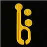 Detail of yellow plastic rolling cutter tool with interchangeable blades for fondant DIY