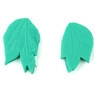 Detailed macro view of green four-leaf clover silicone fondant mold with realistic leaf texture