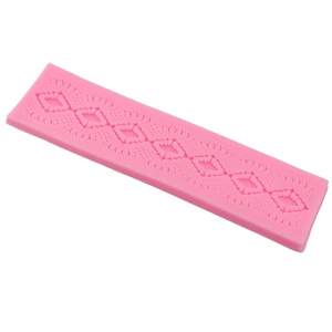 Pink silicone lace fondant mold with continuous diamond pattern for cake decorating