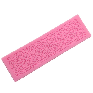 Pink lace silicone fondant mold for DIY cake decoration with floral and heart patterns