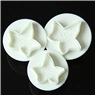 Macro detail of plum blossom spring plungers for fondant and cookie dough crafting
