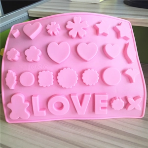 Pink silicone DIY baking mold featuring heart, flower shapes and LOVE letter cavities