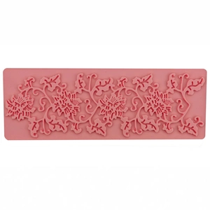 Pink silicone fondant lace mold with intricate floral pattern for cake decoration