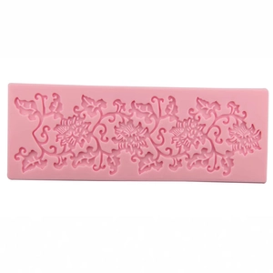Pink rectangular silicone fondant mold with detailed floral and vine embossed patterns