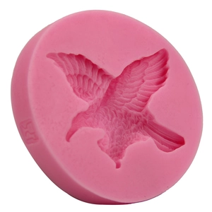 Stampo tondo in silicone rosa con design ad aquila dettagliato per decorazioni torte