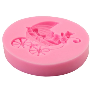 Pink silicone mold featuring detailed baby stroller patterns for fondant cake decoration