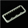 Detail view of white plastic rectangle cookie cutter with wave-shaped molds for baking
