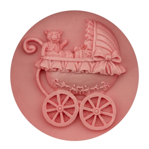 Pink round fondant mold featuring a 3D embossed teddy bear in a lace baby carriage