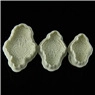 Three-piece set of scalloped star-shaped cookie cutters in graduated sizes for baking