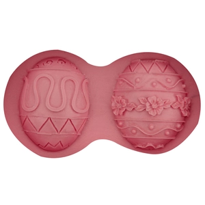 Pink silicone Easter egg mold with embossed floral and wave patterns for DIY fondant baking