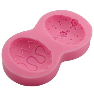 Pink silicone Easter egg fondant mold with floral patterns for DIY baking decoration