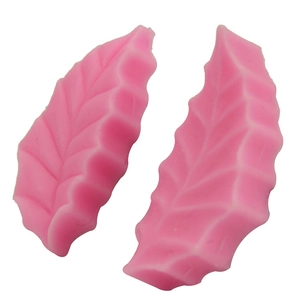Pink leaf-shaped silicone fondant mold set with detailed leaf vein textures for DIY baking