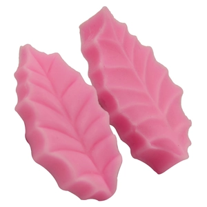 Pink leaf-shaped silicone fondant mold for DIY cake baking and realistic leaf patterns