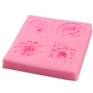 Stampo in silicone rosa con quattro motivi floreali per fondente e decorazione torte