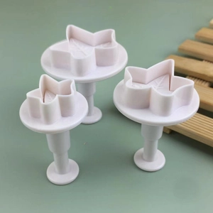 Set of 3 maple leaf plunger cutters in light pink for fondant and cookie cake decoration