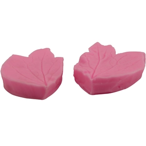 Pink leaf-shaped silicone fondant mold with realistic veins for DIY cake decorating