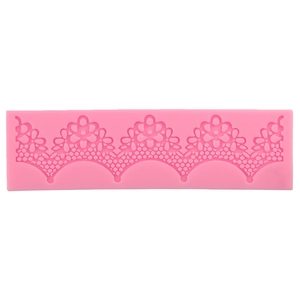 Pink lace silicone fondant mold for cake decorating with floral and wave patterns