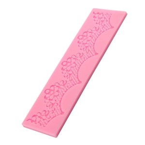 Pink silicone lace mold for fondant cake decoration with intricate floral textures
