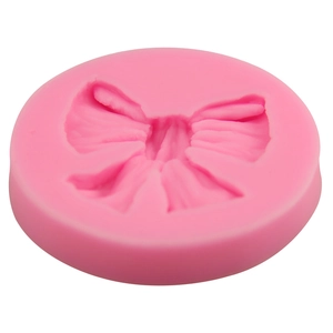 Pink bow-shaped silicone fondant mold for DIY cake baking and chocolate crafting