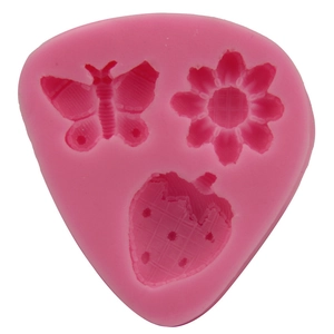 Pink silicone mold featuring butterfly, flower and strawberry shapes for DIY baking cake
