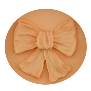 Pink round bow relief silicone mold for DIY fondant cake baking and soap making