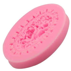Pink silicone fondant mold with baroque floral leaf pattern for DIY cake decorating