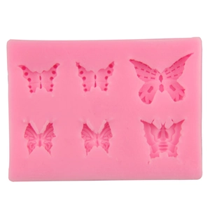 Pink butterfly silicone fondant mold for cake decorating with six different butterfly shapes
