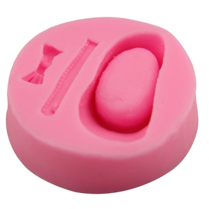 Pink silicone shoe and bow mold for fondant cakes and DIY baking crafts shown at 45 degrees