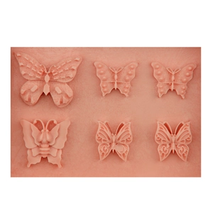 Pink butterfly silicone fondant mold with six detailed patterns for DIY cake decorating
