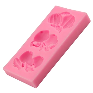 Pink silicone fondant mold with floral plant shapes for cake decorating and DIY baking