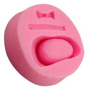 Pink silicone shoe-themed fondant mold with bow and zipper design for cake decoration