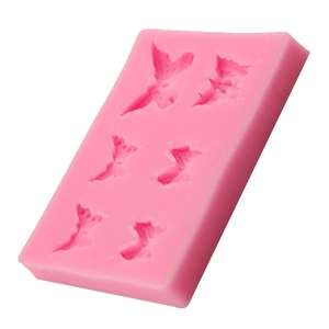 Pink silicone butterfly fondant mold for DIY cake decorating and baking tools