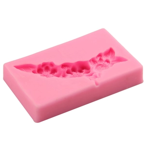 Pink silicone fondant cake mold with three floral patterns for DIY baking and decoration